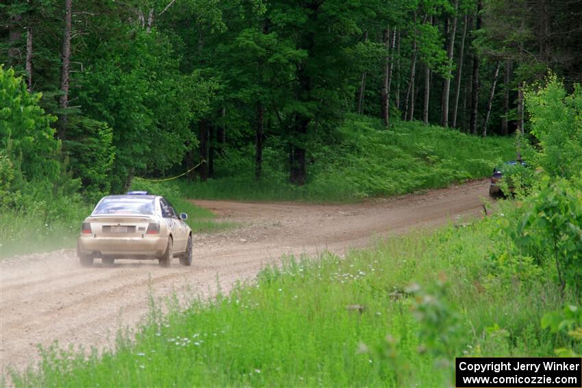 Tim Michel / Alex Ferencz Audi A4 Quattro chases Jimmy Pelizzari / Bryce Proseus Subaru WRX on SS3, Woodtick Hollow.