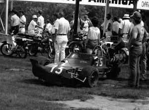 Bruce Clark's Lola T-560 suffered heavy damage in a practice collision with Mark Moore at turn 14.