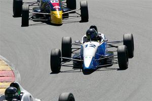 Bob Reid's Spectrum 015 and Jay Messenger's Van Diemen RF99