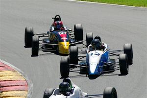 Bob Reid's Spectrum 015 and Jay Messenger's Van Diemen RF99