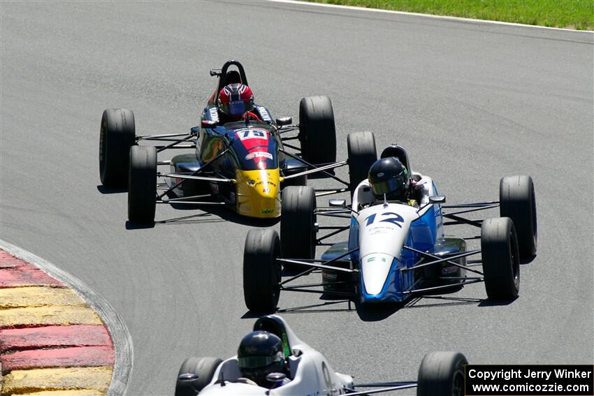 Bob Reid's Spectrum 015 and Jay Messenger's Van Diemen RF99