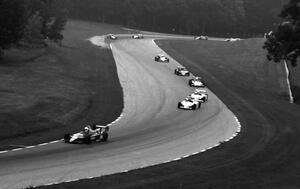 Pete Halsmer leads Al Unser, Jr., Bob Earl, Arie Luyendyk, Chip Ganassi, Bob Schader, etc through the Hurry Downs.