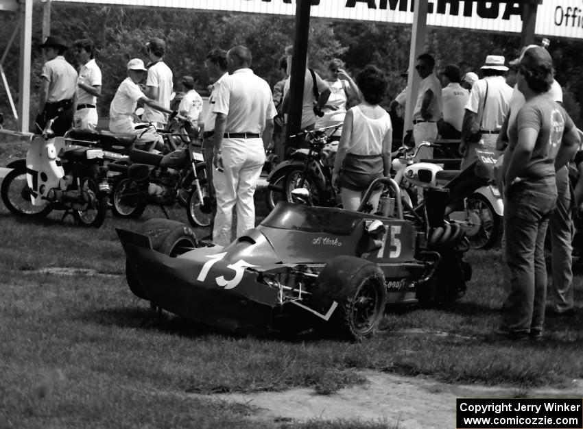 Bruce Clark's Lola T-560 suffered heavy damage in a practice collision with Mark Moore at turn 14.