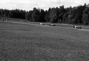 Formula Fords fly down the Kinnard Straight early in the race.