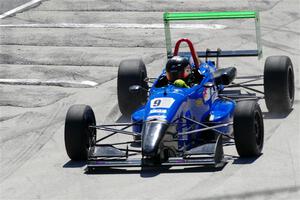 Cooper Travis' Van Diemen Élan DP08 goes wide at Canada Corner.