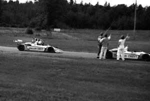 Bob Earl's stranded Ralt RT-5/81 is passed by Al Unser, Jr.'s winning Ralt RT-5/81.