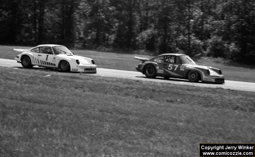 Monte Shelton's Porsche 930 ahead of John Bauer's Porsche 911SC entering turn 6