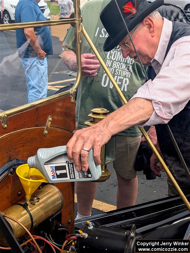 Topping off the oil at the stop in Buffalo, MN.
