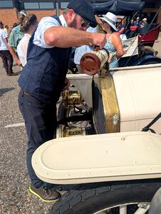 Wade Donley / Jenny Donley 1908 Overland stops for water in Anoka, MN.