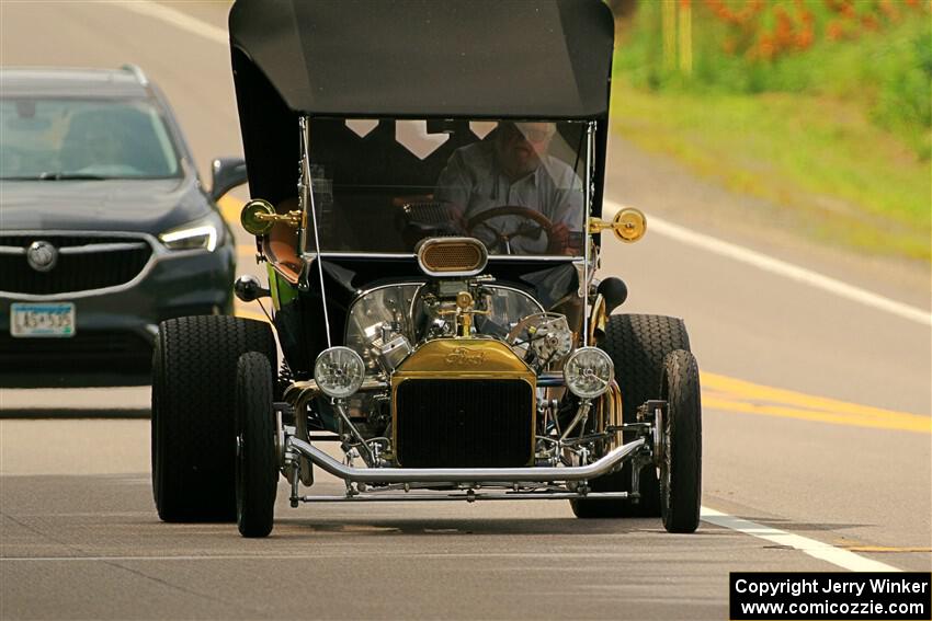 Okay, not really an antique car on the run.