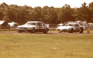 Vern Smith's Mercury Capri leads Irv Hoerr's Pontiac Firebird