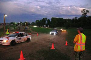 Richard Donovan / Greg Donovan Subaru Impreza and Mark Tabor / Kathryn Hansen Ford Fiesta ST exit out of SS2, Soo Pass II.