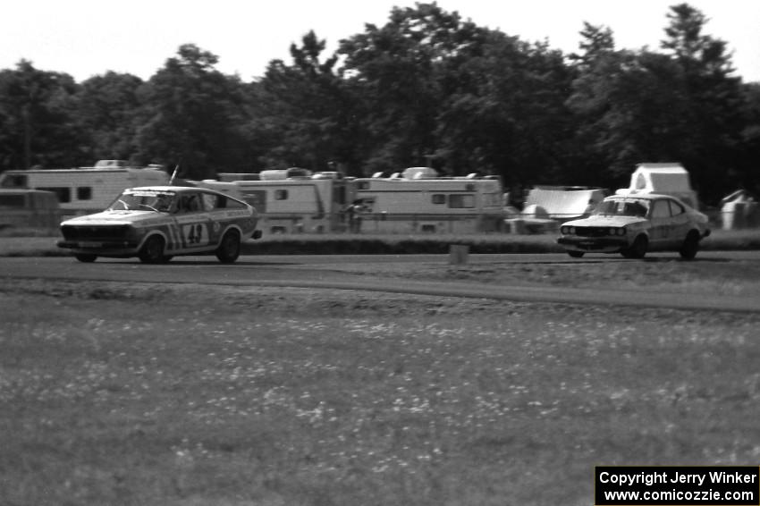 Rameau Johnson's Datsun B210 and V.J. Elmore's Mazda RX-3