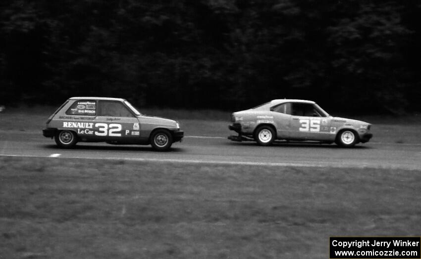 Chuck Ulinski's Mazda RX-3 leads Bobby Archer's Renault LeCar