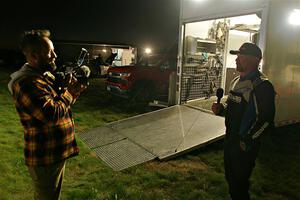 A driver is interviewed at Pioneer Farm service after day two.
