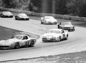 The leaders come into Canada Corner, turn 12.