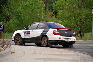 Jason Cook / Maggie Tu Subaru WRX on SS20, Sanford Center.