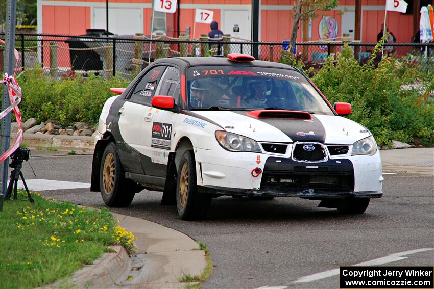 Jason Cook / Maggie Tu Subaru WRX on SS20, Sanford Center.