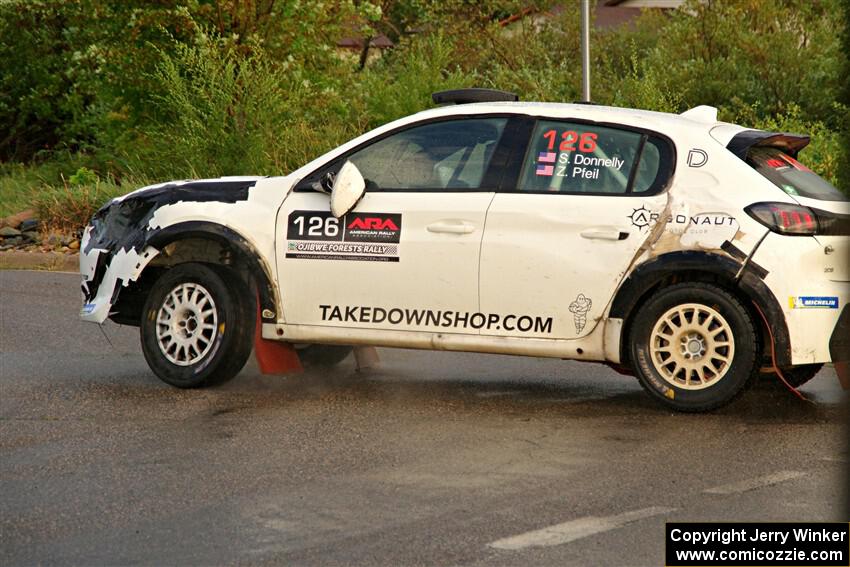 Sean Donnelly / Zach Pfeil Peugeot 208 Rally4 on SS20, Sanford Center.