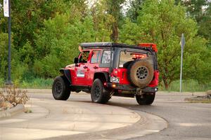 A Jeep Wrangler Rubicon sweeps SS20, Sanford Center.