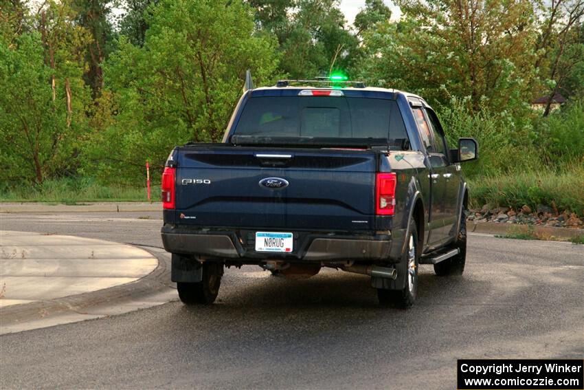 A Ford F-150 pickup sweeps SS20, Sanford Center.