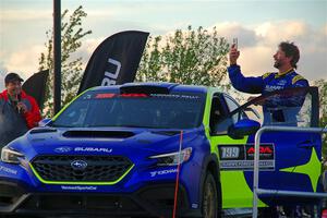 Travis Pastrana takes a selfie on the winner's podium.