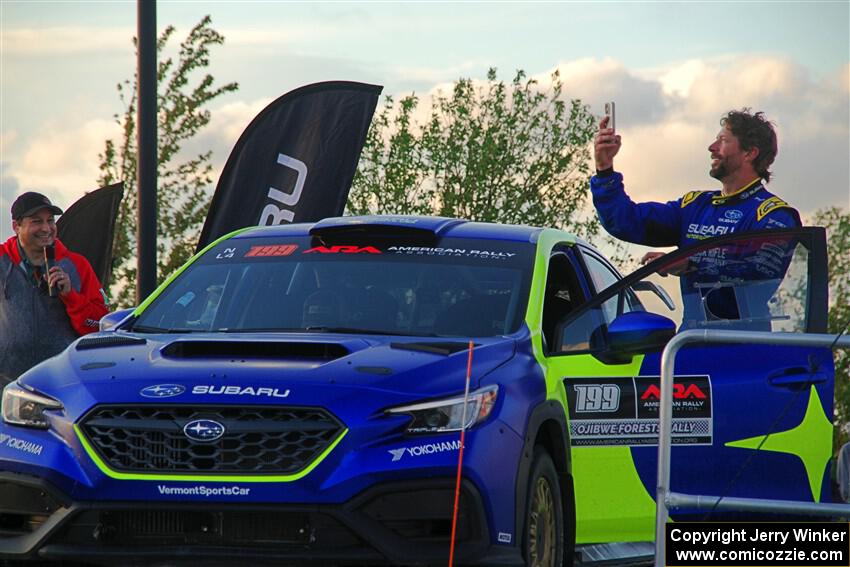 Travis Pastrana takes a selfie on the winner's podium.