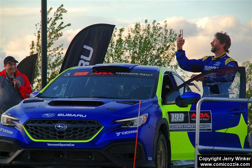 Travis Pastrana takes a selfie on the winner's podium.