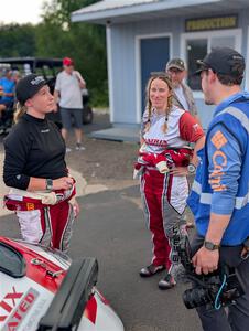 Madelyn Tabor, Sophia McKee and Ryan Lund converse at parc expose at Soo Pass Ranch.