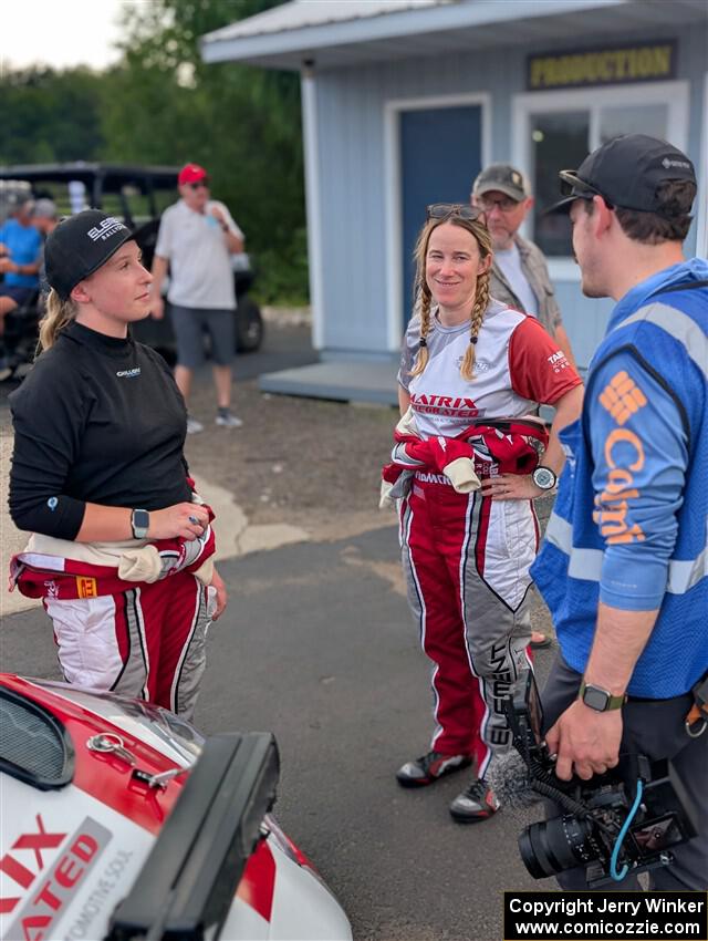 Madelyn Tabor, Sophia McKee and Ryan Lund converse at parc expose at Soo Pass Ranch.