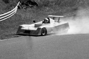 Jerry Booker's Brabham BT C-Sports Racer loses its engine.