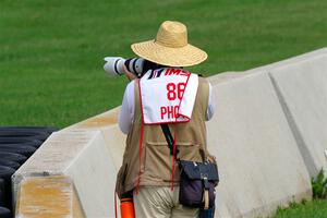 Road America photographer Pete Gorski shoots the second race from the outside of turn 8.