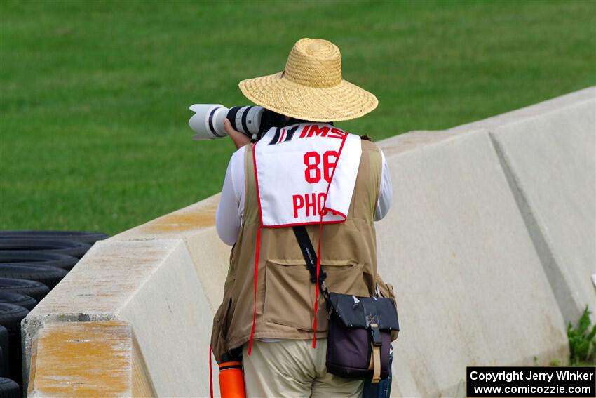 Road America photographer Pete Gorski shoots the second race from the outside of turn 8.