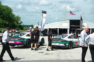Michael McCarthy's and Kay van Berlo's Porsche GT3 Cups in the paddock.