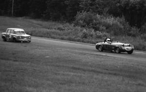 Gary Davis's H Production Austin-Healey Sprite leads John Dozier's GT-4 Renault R-8 Gordini