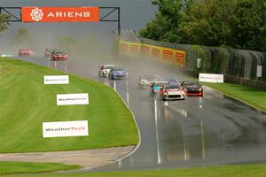 The field streams down into turn 3 on the restart.