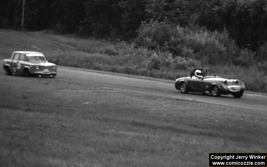 Gary Davis's H Production Austin-Healey Sprite leads John Dozier's GT-4 Renault R-8 Gordini