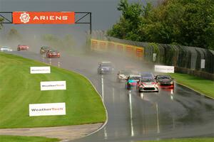 The field streams down into turn 3 on the restart.