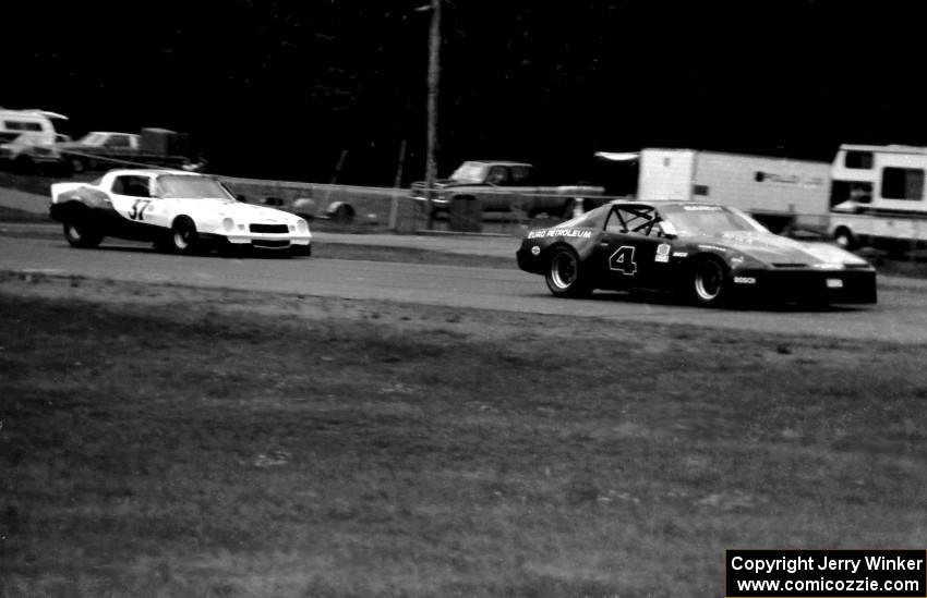 Darin Brassfield's Pontiac Trans-Am leads Dave Chizek's Chevy Camaro