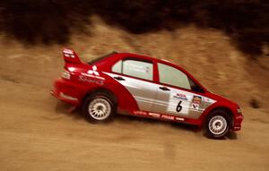 Lauchlin O'Sullivan / Christian Edstrom Mitsubishi Lancer Evo 8 on the practice stage