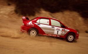 David Higgins / Daniel Barritt Mitsubishi Lancer Evo 8 on the practice stage