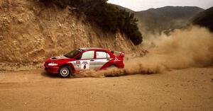 Lauchlin O'Sullivan / Christian Edstrom Mitsubishi Lancer Evo 8 on the practice stage