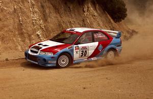 George Plsek / Jeff Burmeister Mitsubishi Lancer Evo 6 on the practice stage