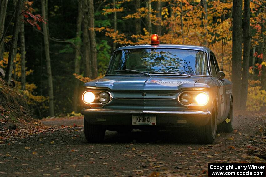Tyler Linner's Chevy Corvair checks the course as Stage Captain on SS15, Mount Marquette.