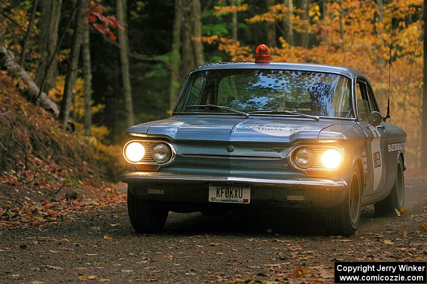 Tyler Linner's Chevy Corvair checks the course as Stage Captain on SS15, Mount Marquette.