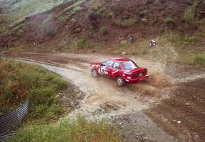 The Mark Tabor / Kevin Poirier Nissan Sentra SE-R hits a stream on Del Sur 1.