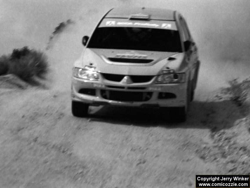 David Higgins / Daniel Barritt Mitsubishi Lancer Evo 8 on the practice stage