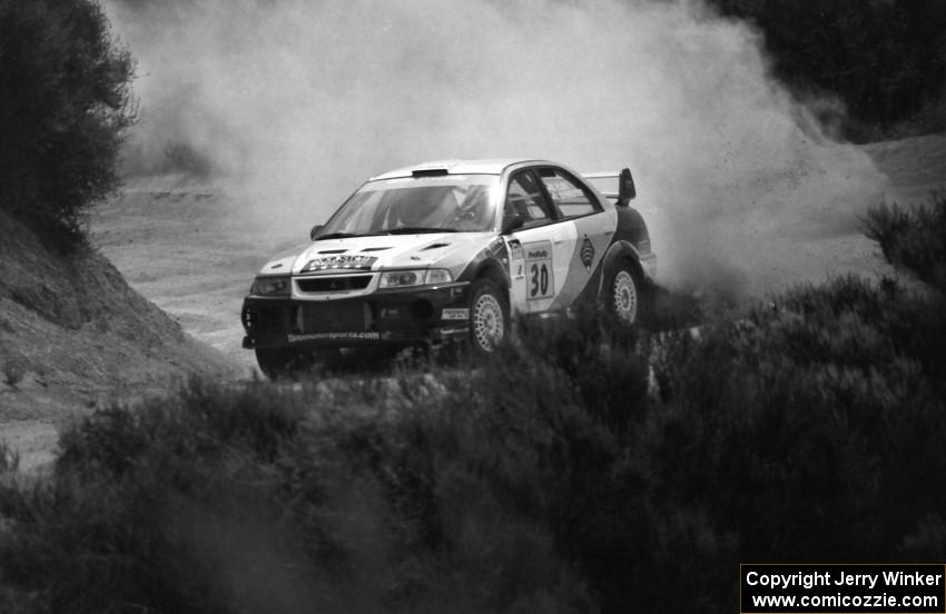 George Plsek / Jeff Burmeister Mitsubishi Lancer Evo 6 on the practice stage