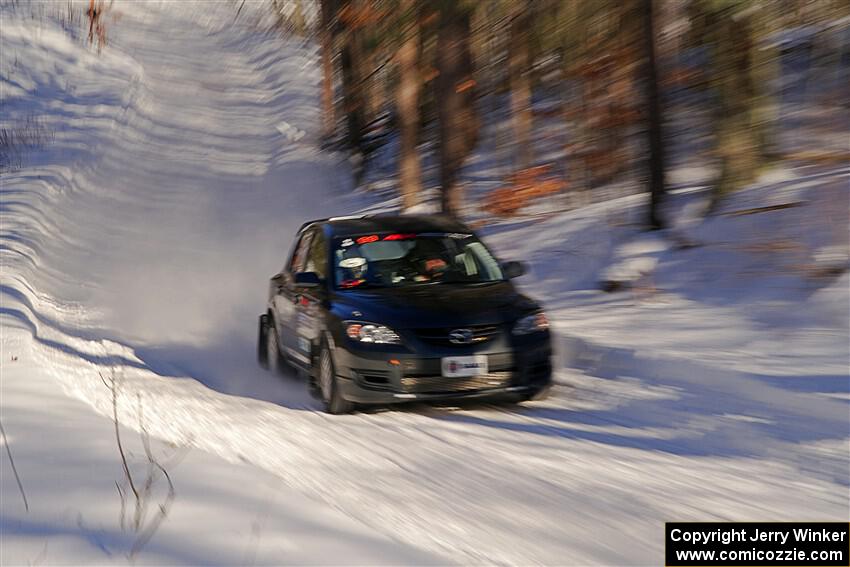 Sandy Liversidge / Tiago Lourenco Mazda Speed 3 on SS13, Sage Creek-Vondette.