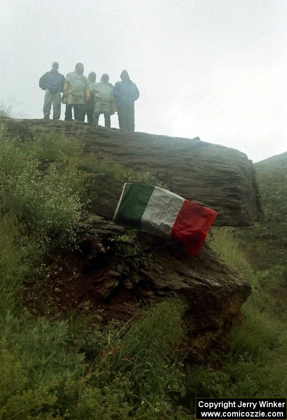 Irish fans from Yonkers on top of a large rock on Del Sur in the heavy rain.
